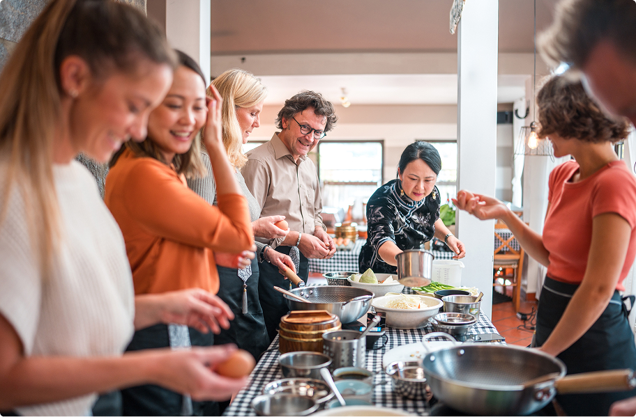 Group of people cooking Chinese food